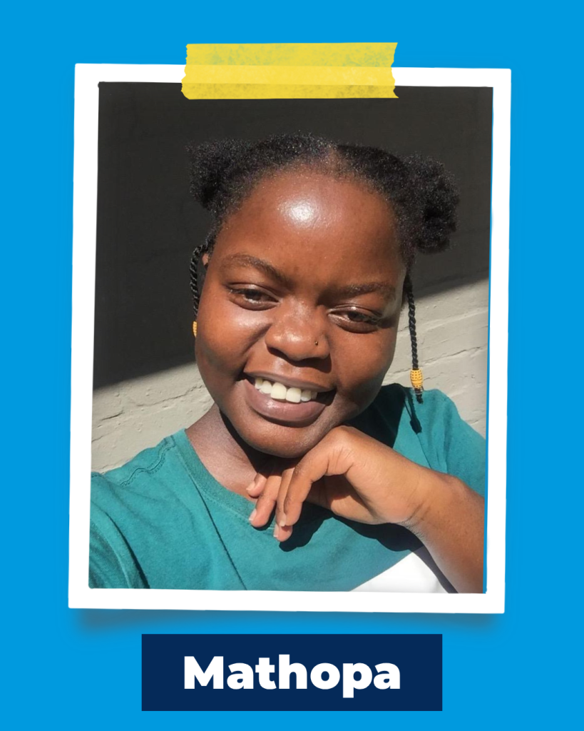A photo of Mathopa smiling at the camera